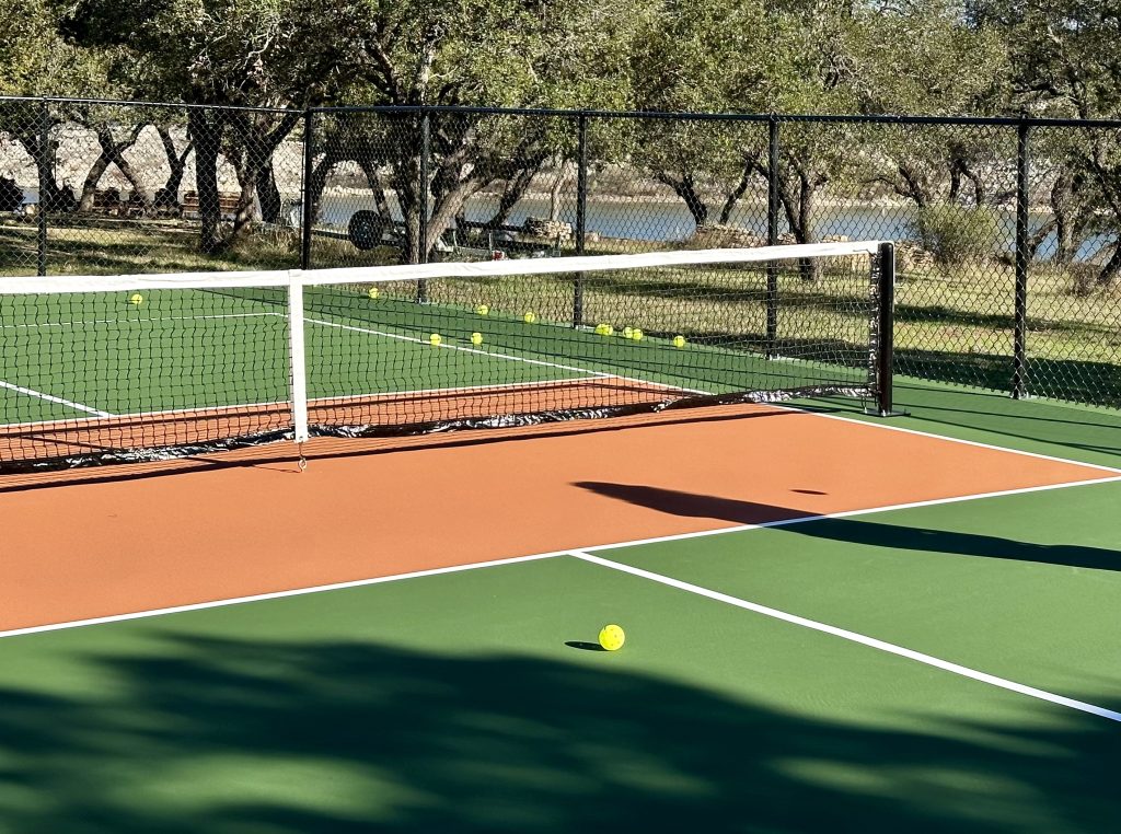 Park Tennis Court With Fencing